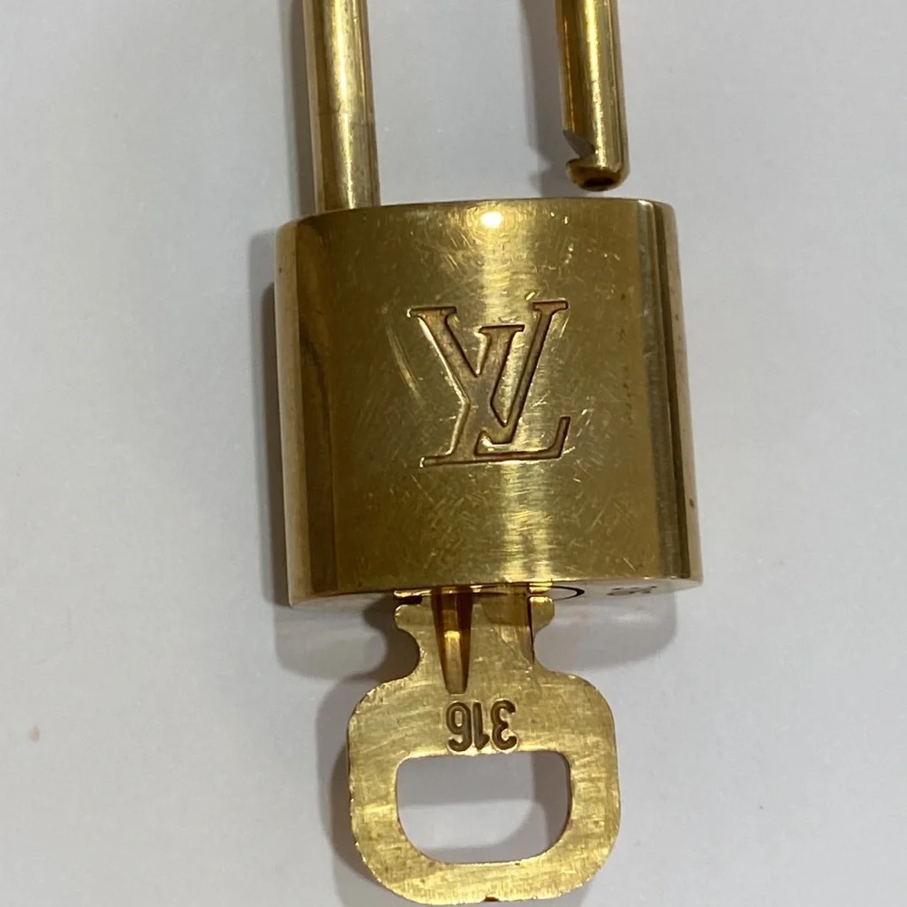 #316 LV lock key March 16 Louis Vuitton gold tone brass Anniversary Birthday